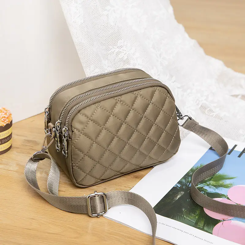 Black Rhombus Crossbody Bag with Patterned Strap