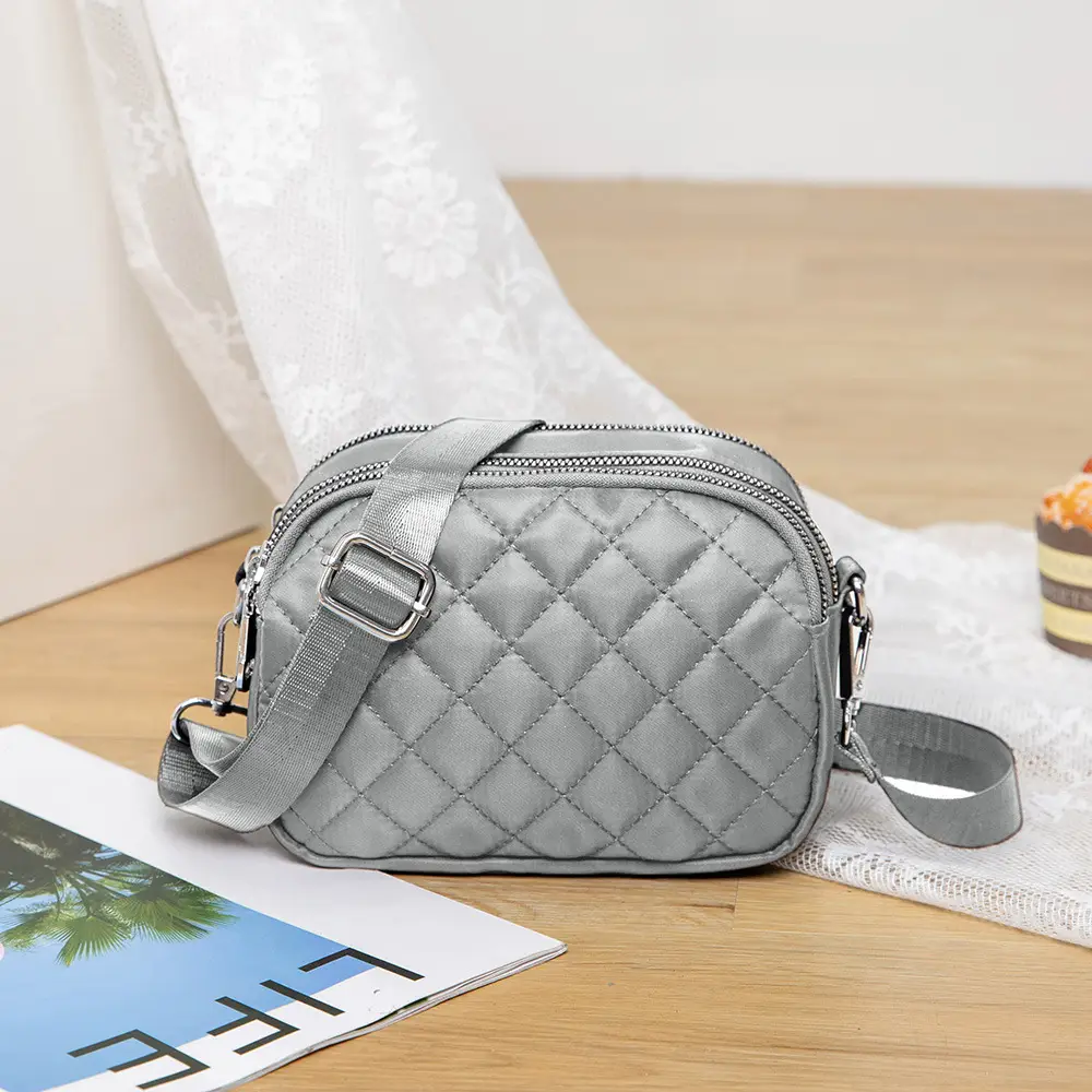 Black Rhombus Crossbody Bag with Patterned Strap