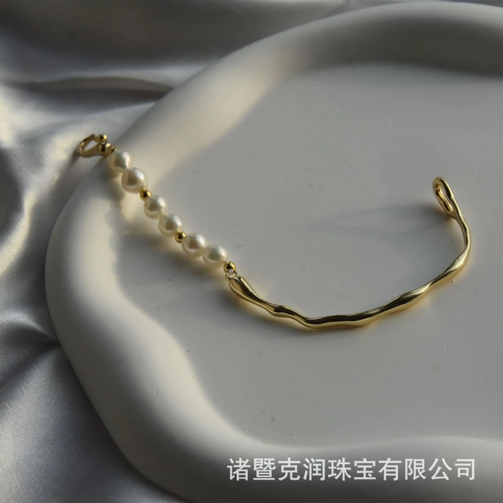 Gold Pearl Bracelet with Water Drop Design - Image 3