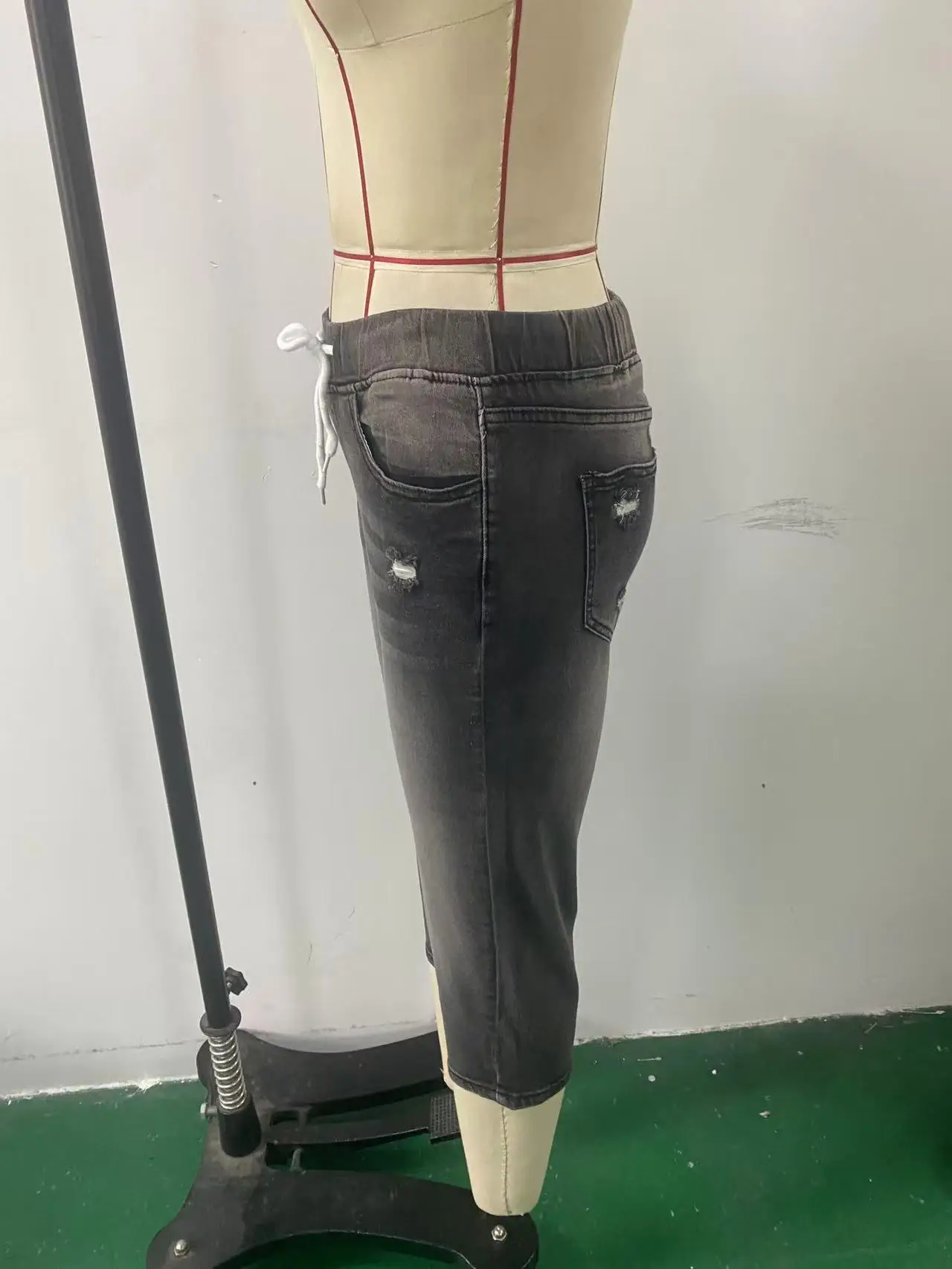 Women's Ripped High-Stretch Denim Capri Pants with Drawstring Waist — feature 10