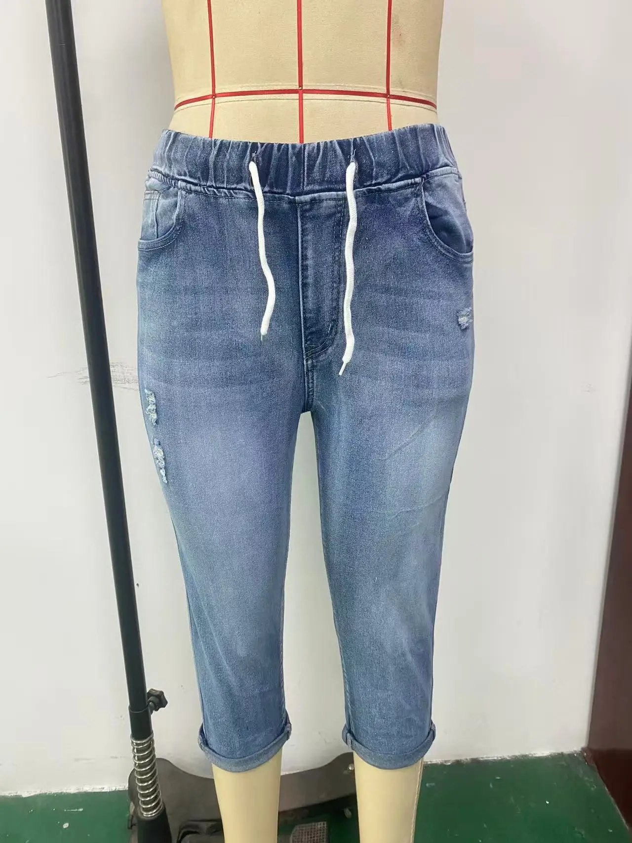 Women's Ripped High-Stretch Denim Capri Pants with Drawstring Waist — feature 2
