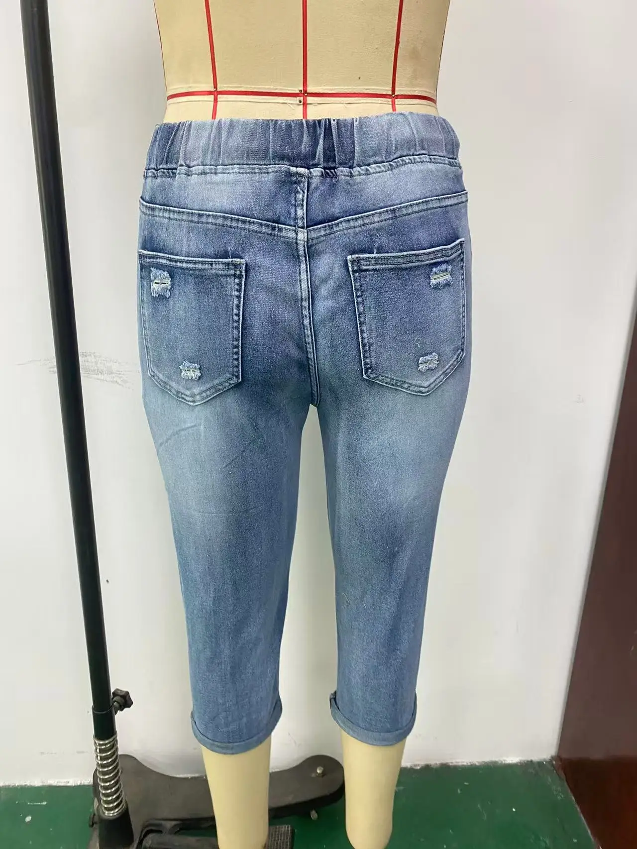 Women's Ripped High-Stretch Denim Capri Pants with Drawstring Waist — feature 3