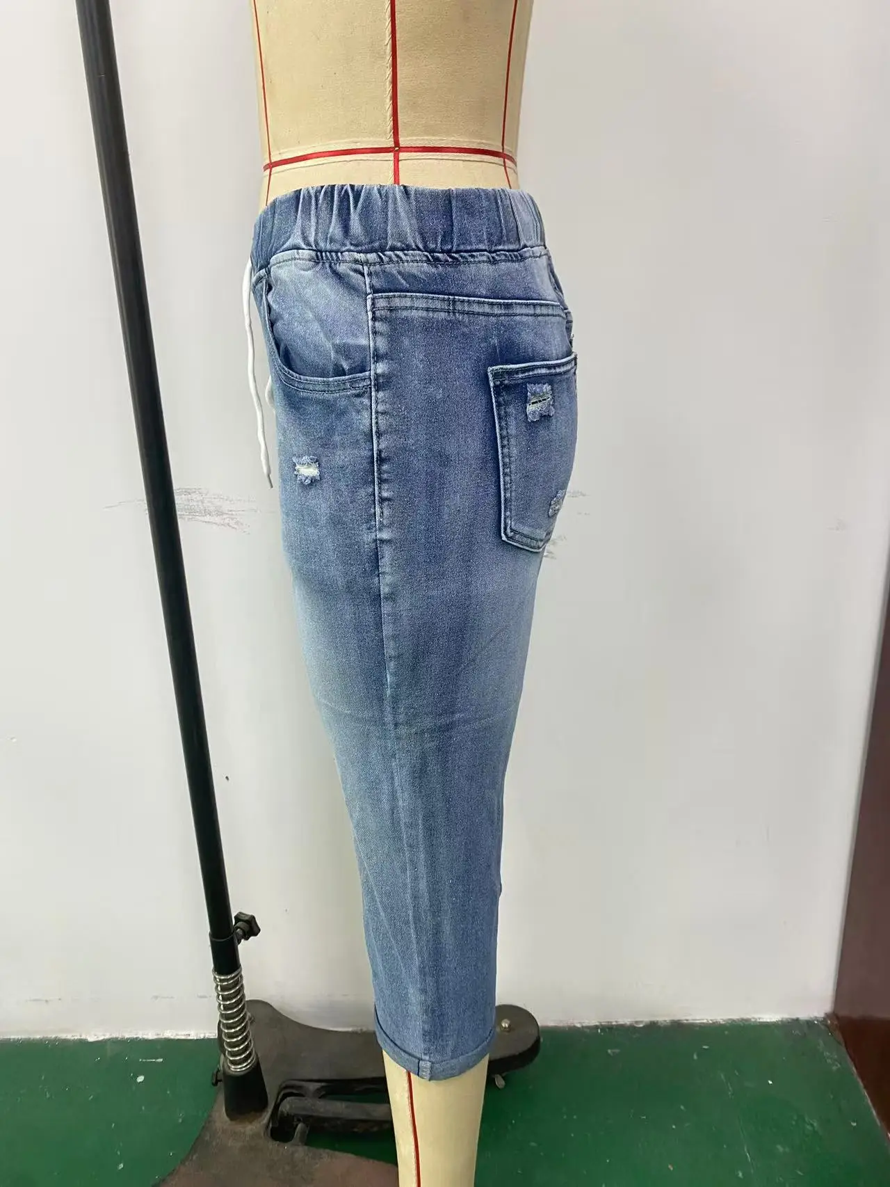 Women's Ripped High-Stretch Denim Capri Pants with Drawstring Waist — feature 4