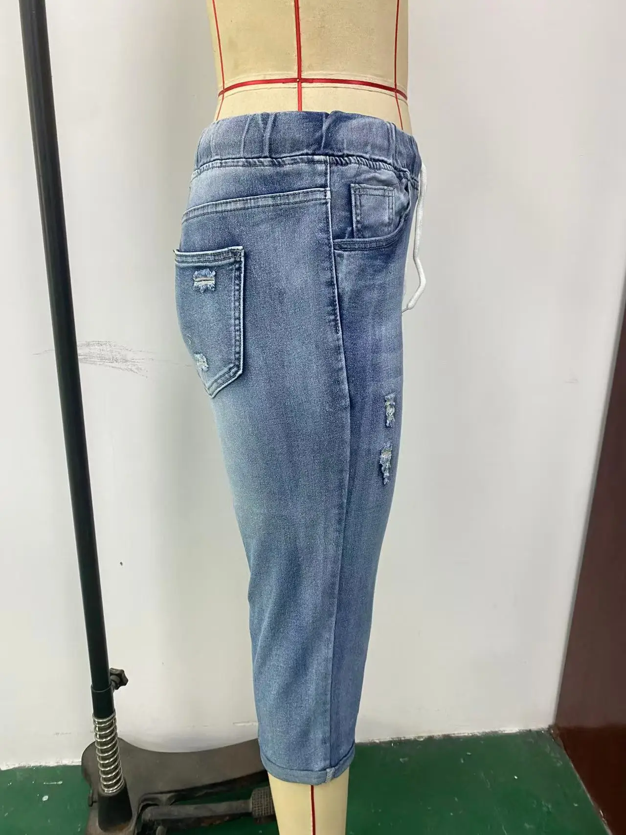 Women's Ripped High-Stretch Denim Capri Pants with Drawstring Waist — feature 5