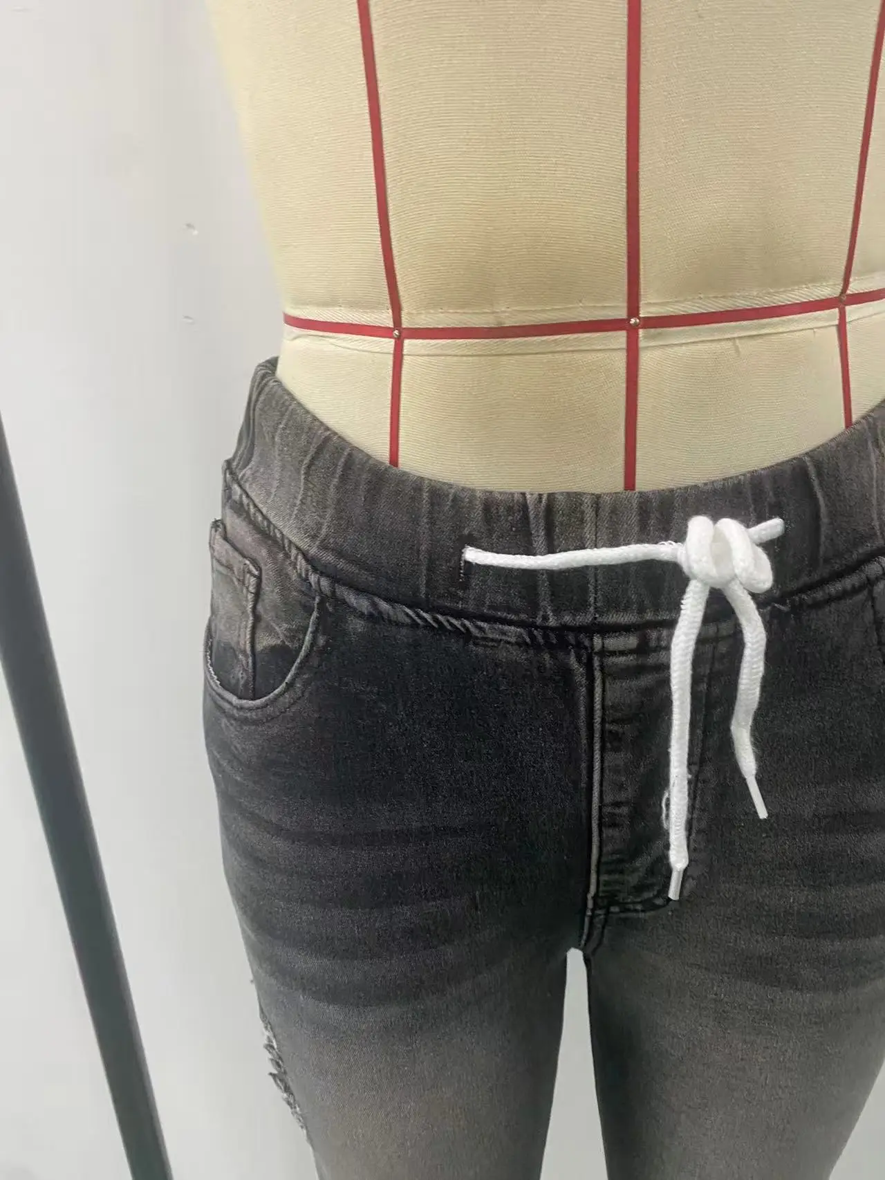 Women's Ripped High-Stretch Denim Capri Pants with Drawstring Waist — feature 7