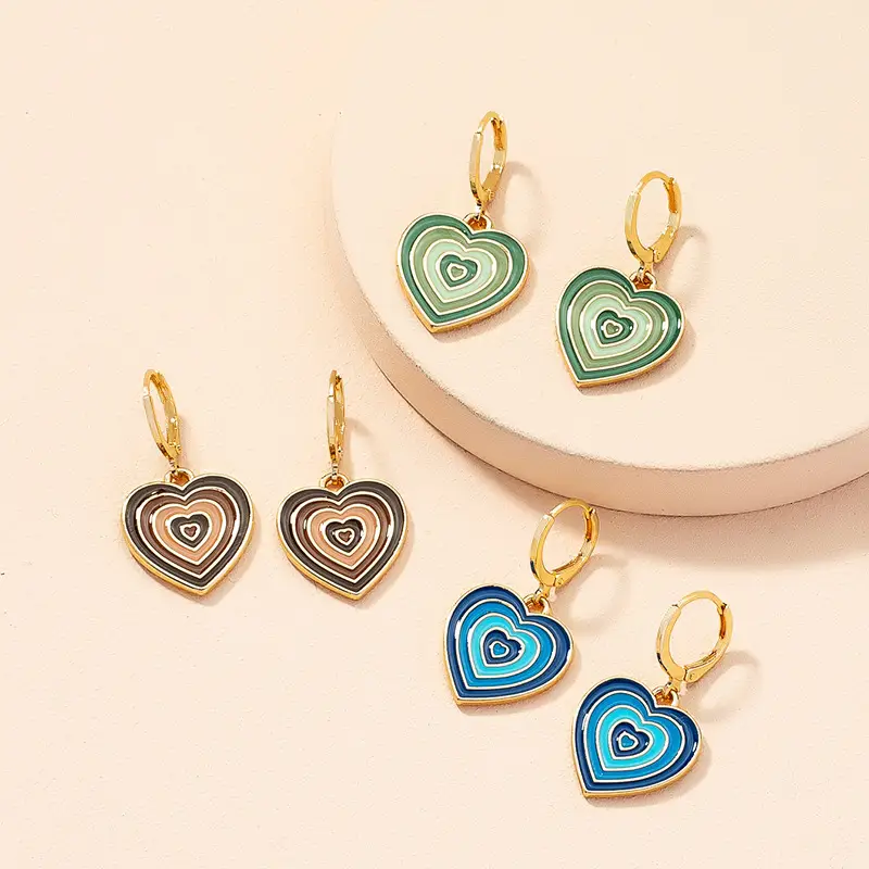 Gold Cross Twist Ear Clips for Women — feature 4