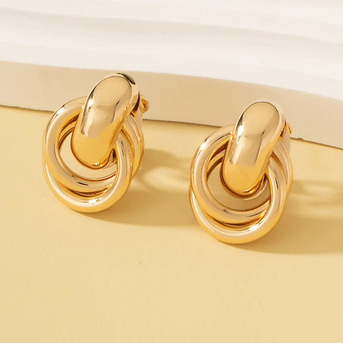 Gold Cross Twist Ear Clips for Women - Image 2