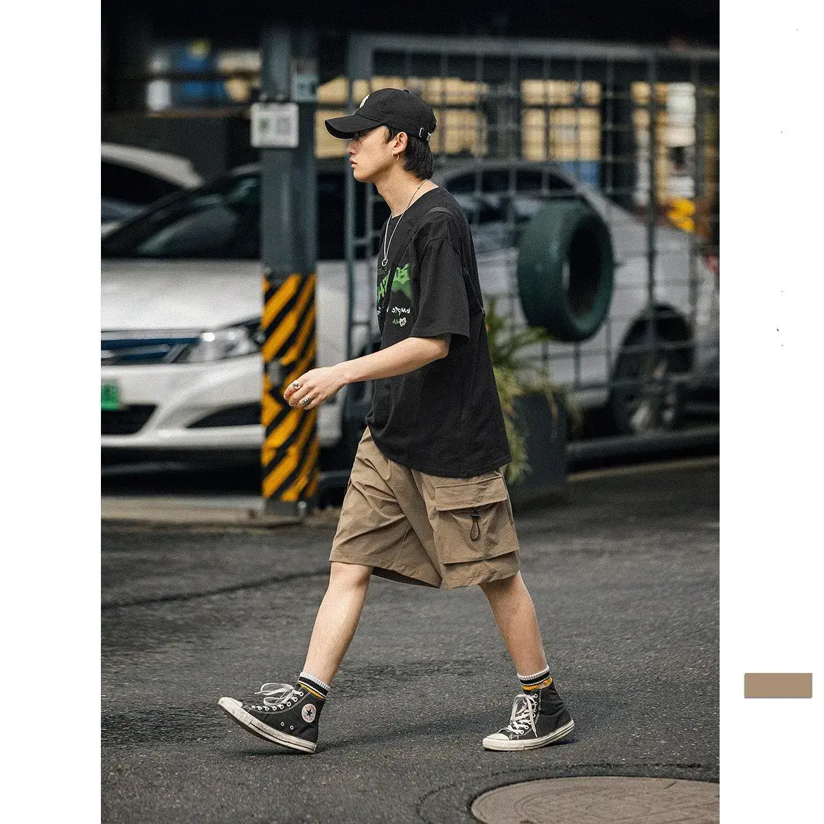 Men's Black Graphic Shorts with Cap and Sneakers - Image 7
