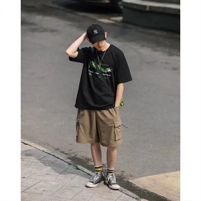 Men's Black Graphic Shorts with Cap and Sneakers — feature 3