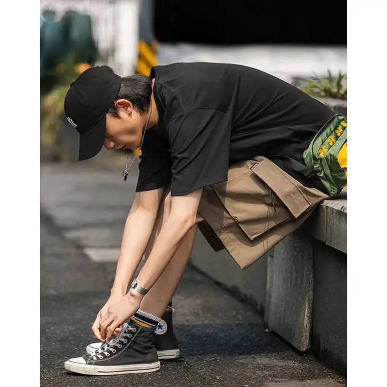Men's Black Graphic Shorts with Cap and Sneakers — feature 4