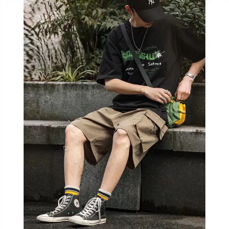 Men's Black Graphic Shorts with Cap and Sneakers — feature 5