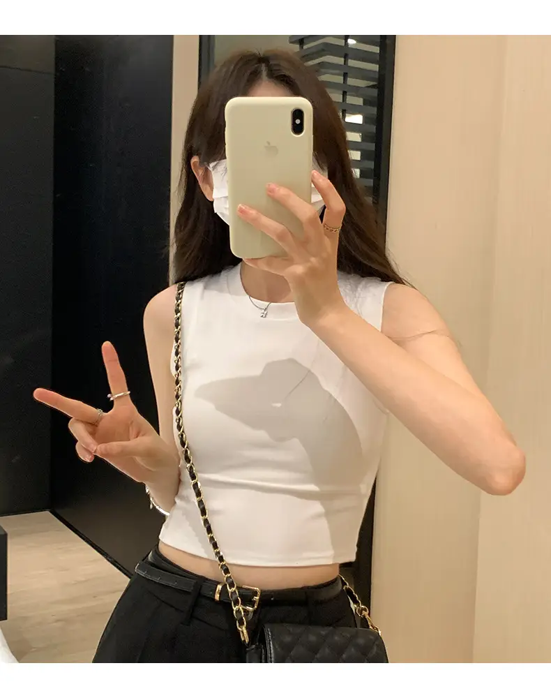 Black Sleeveless Top with Gold Necklace & Black Handbag — feature 5