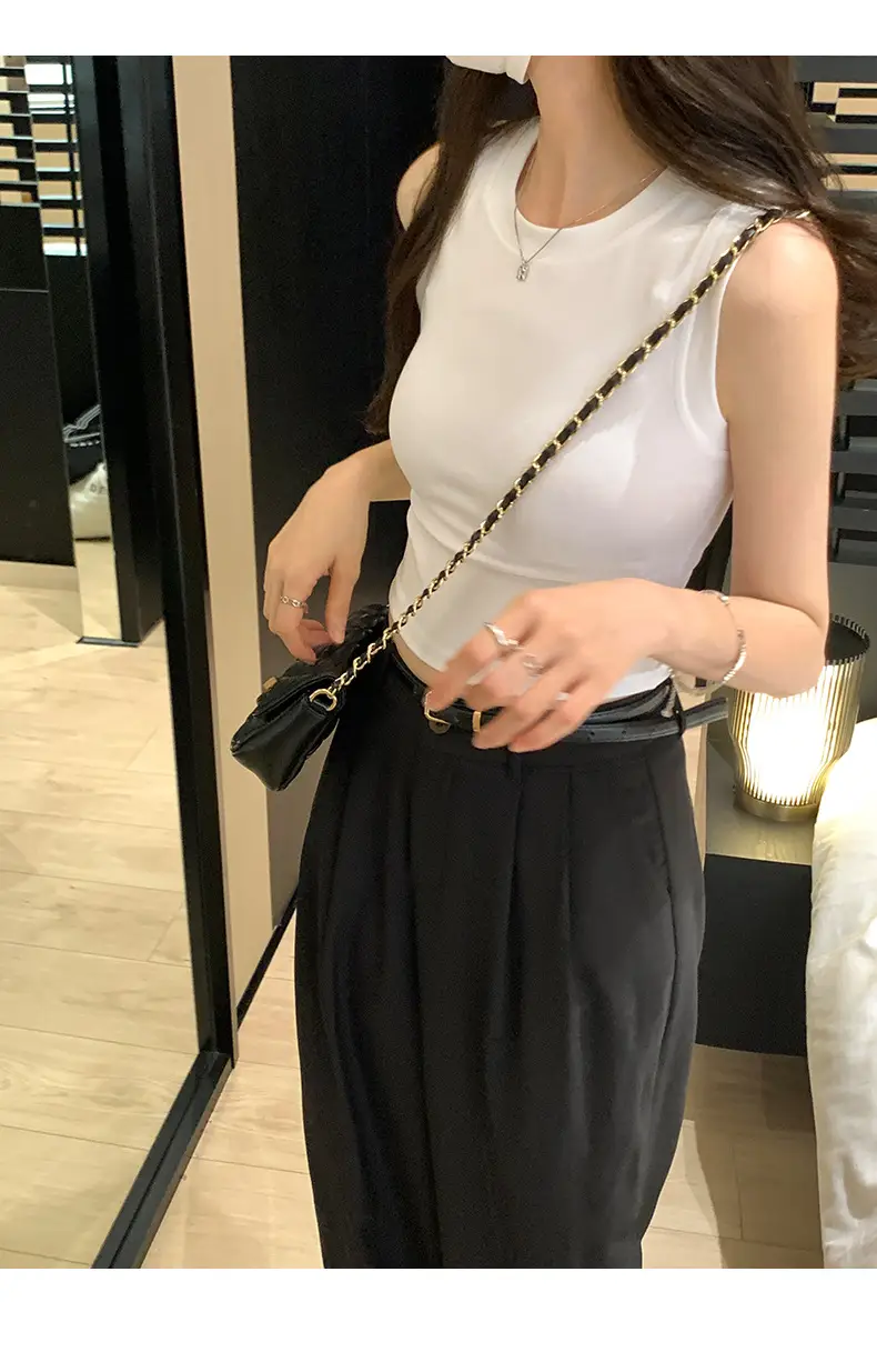 Black Sleeveless Top with Gold Necklace & Black Handbag — feature 6