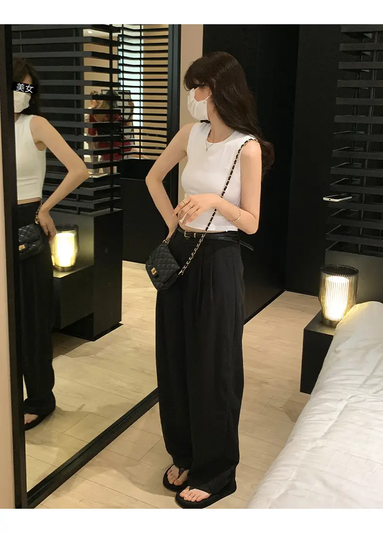 Black Sleeveless Top with Gold Necklace & Black Handbag — feature 7