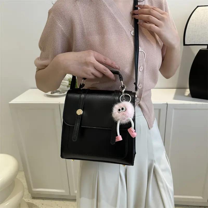 Women's Black Shoulder Backpack with Pom Pom Charm - Image 11