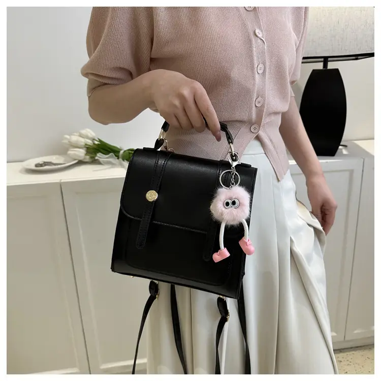 Women's Black Shoulder Backpack with Pom Pom Charm — feature 14