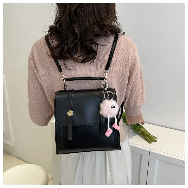 Women's Black Shoulder Backpack with Pom Pom Charm — feature 15