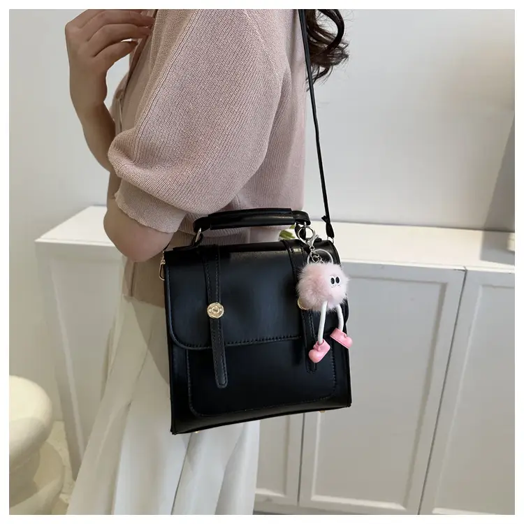 Women's Black Shoulder Backpack with Pom Pom Charm — feature 16