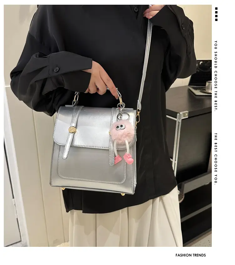 Women's Black Shoulder Backpack with Pom Pom Charm — feature 2