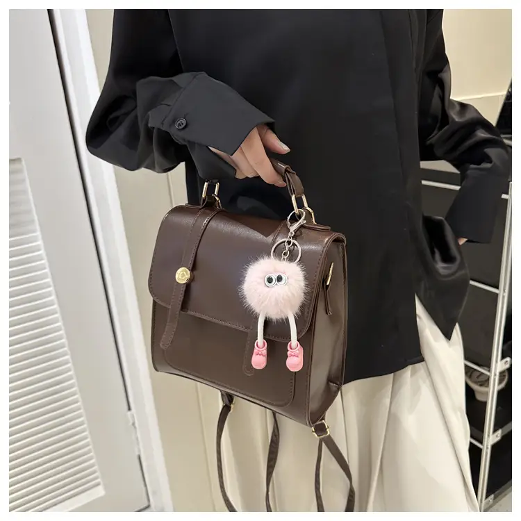 Women's Black Shoulder Backpack with Pom Pom Charm — feature 22