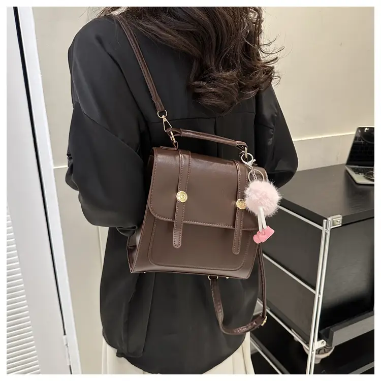 Women's Black Shoulder Backpack with Pom Pom Charm — feature 25