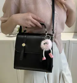 Women's Black Shoulder Backpack with Pom Pom Charm - Image 8