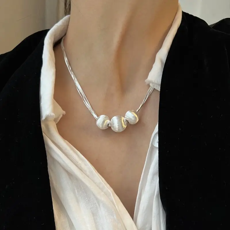 Women's Multi-Layer Snake Bone Chain Necklace with Pearl Accents - Image 3