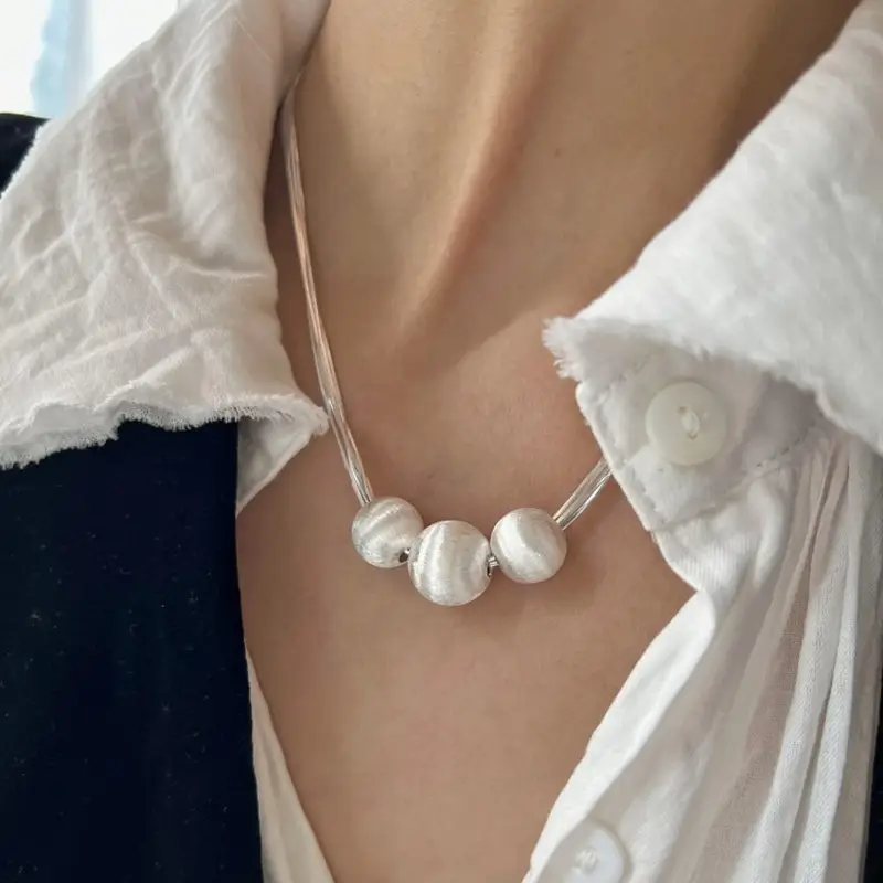Women's Multi-Layer Snake Bone Chain Necklace with Pearl Accents - Image 4