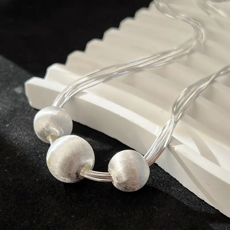 Women's Multi-Layer Snake Bone Chain Necklace with Pearl Accents - Image 5