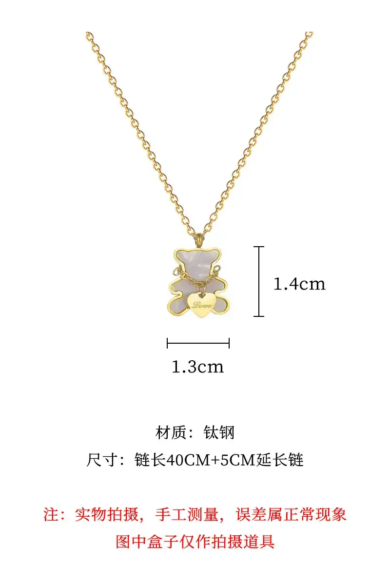 Gold Love Bear Necklace with Heart Design — feature 3