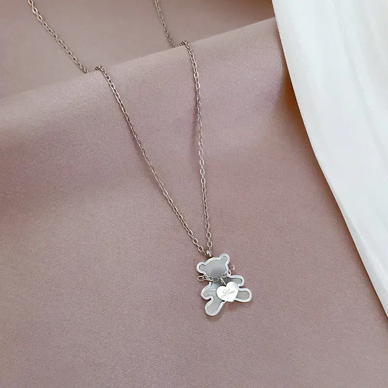 Gold Love Bear Necklace with Heart Design — feature 4
