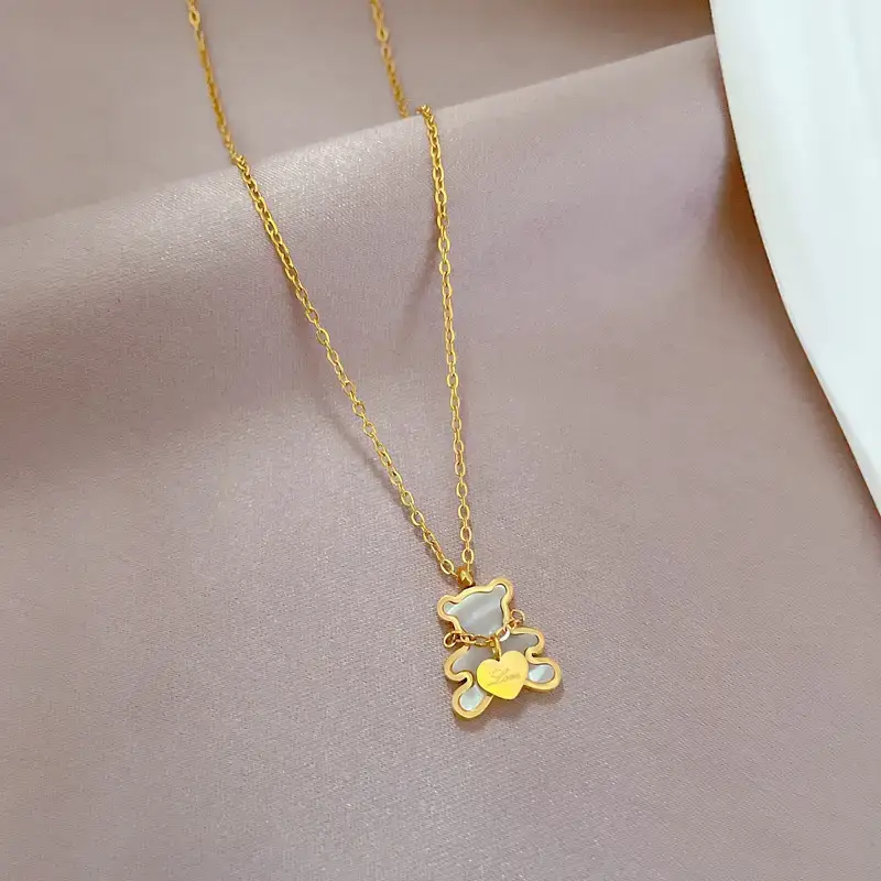 Gold Love Bear Necklace with Heart Design — feature 6