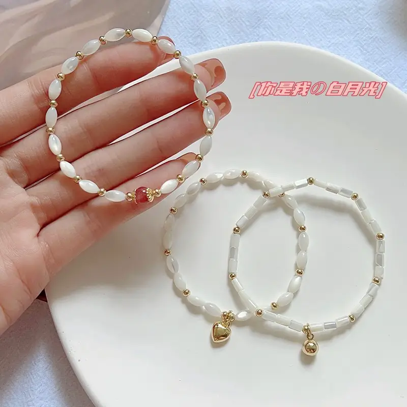 Natural Pearl Bracelet with Gold Beads & Charm — feature 3