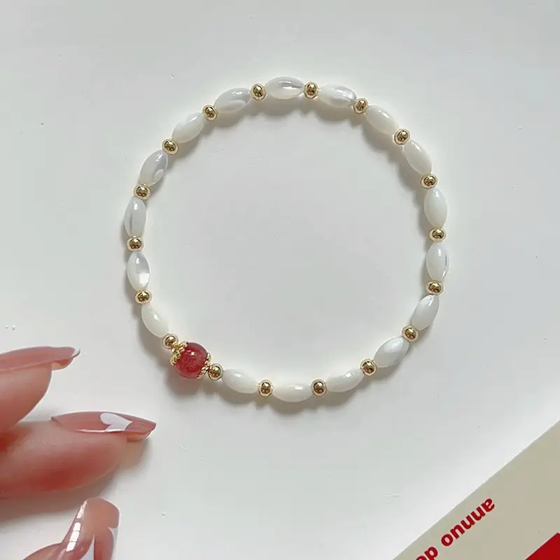 Natural Pearl Bracelet with Gold Beads & Charm - Image 2