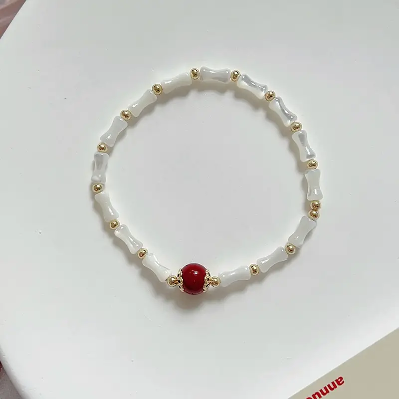 Natural Pearl Bracelet with Gold Beads & Charm - Image 3