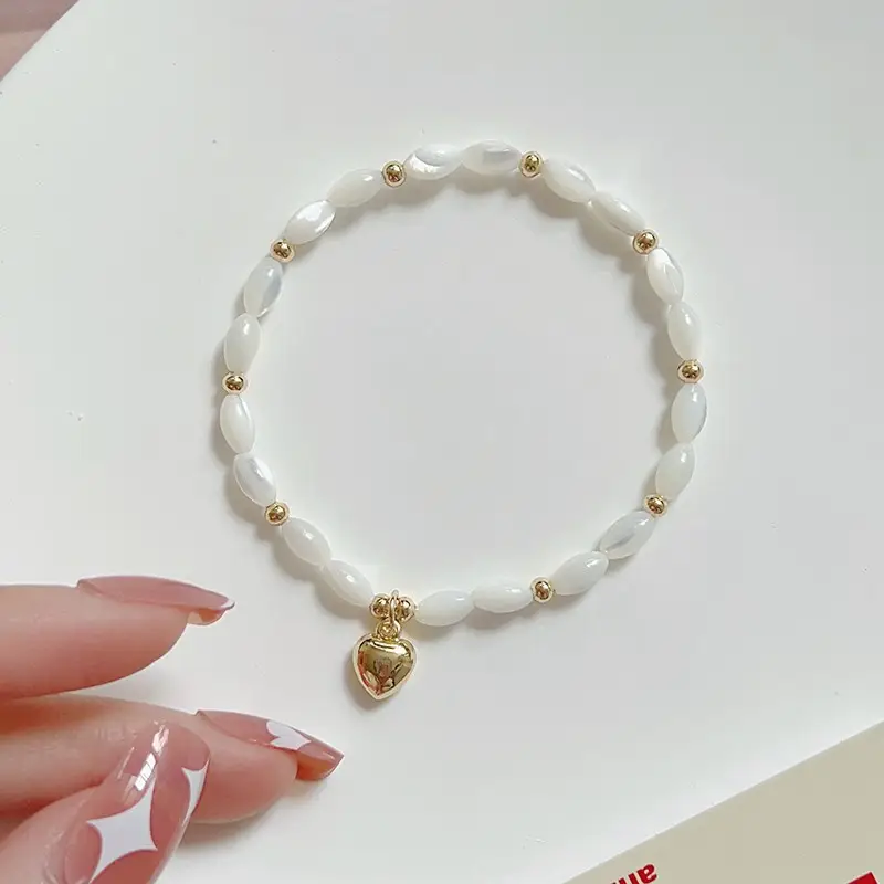 Natural Pearl Bracelet with Gold Beads & Charm - Image 6