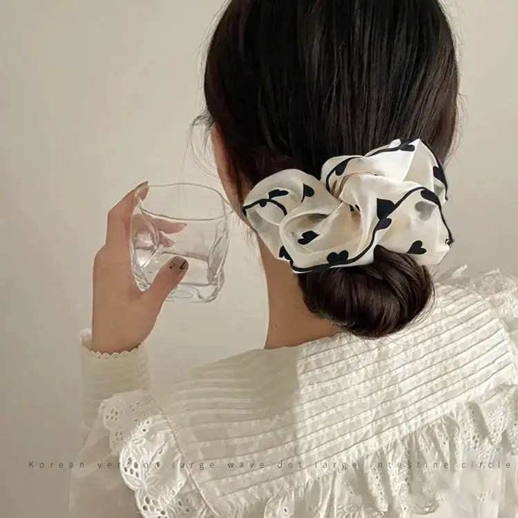 Elegant Black Heart Polka Dot Hair Ring - Image 4