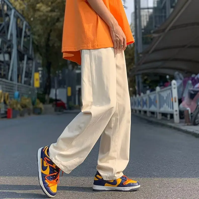 Men's Thin White Sports Pants with Orange Sneakers — feature 7