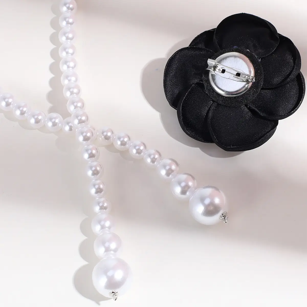 Pearl Waist Chain with Black & White Rose Flower β feature 8