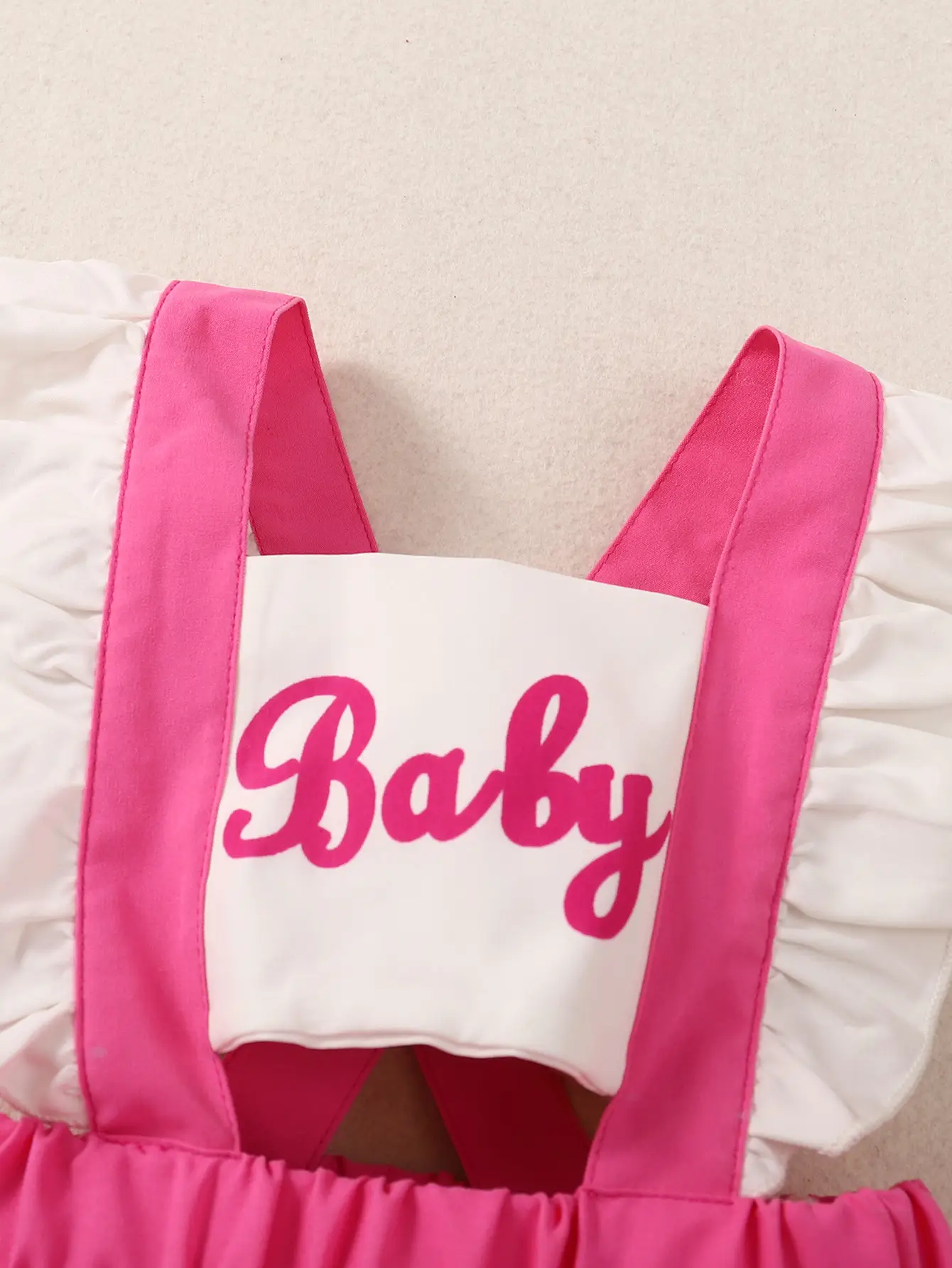 Baby Pink Backless Romper with Bow - Image 5