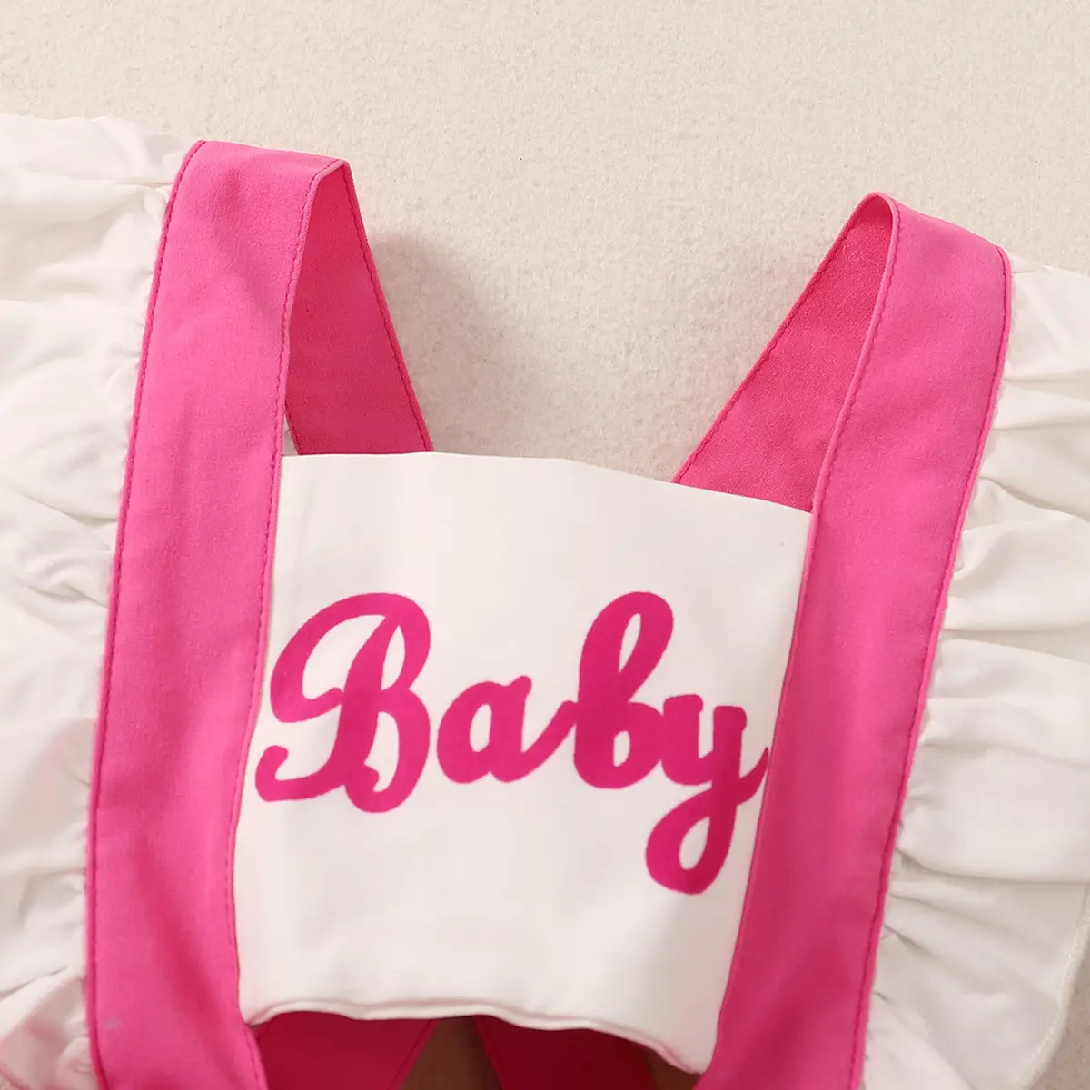 Baby Pink Backless Romper with Bow — feature 4