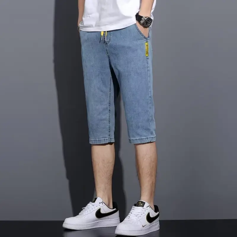 Men Denim Cropped Shorts Grey Yellow Nike - Image 5