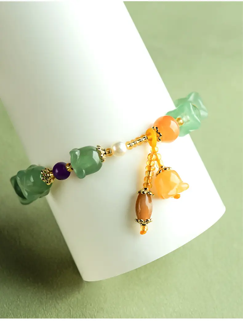Natural Xinjiang Golden Silk Jade Dongling Jade Orchid Bracelet — feature 8