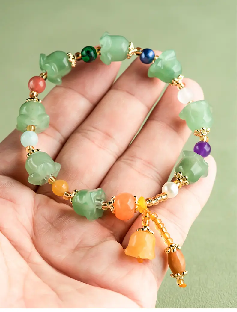 Natural Xinjiang Golden Silk Jade Dongling Jade Orchid Bracelet — feature 9