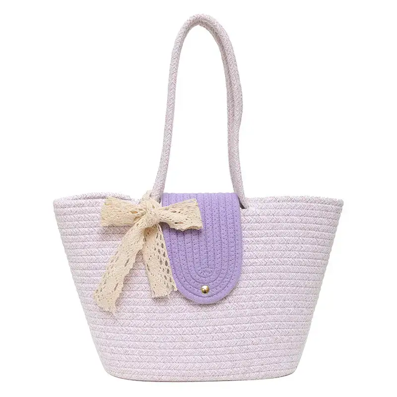 Women's woven straw tote bag with purple accent