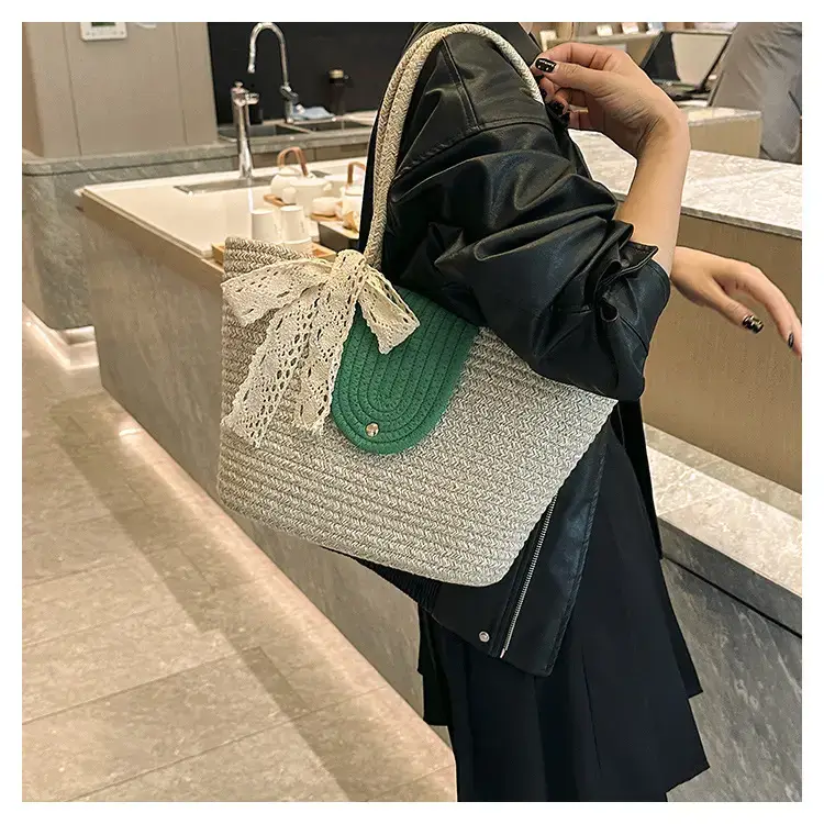 Women's woven straw tote bag with purple accent — feature 11
