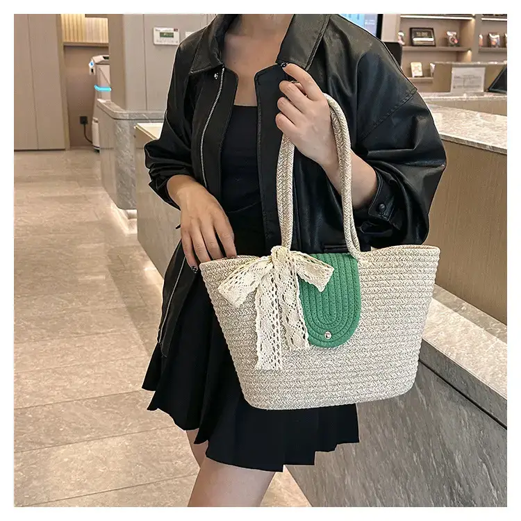Women's woven straw tote bag with purple accent — feature 12