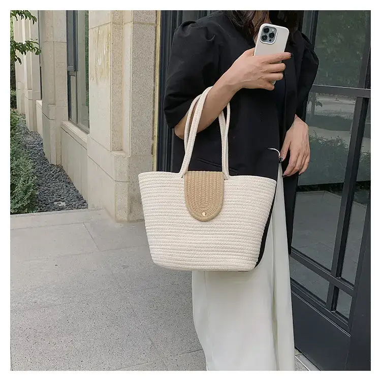 Women's woven straw tote bag with purple accent — feature 16