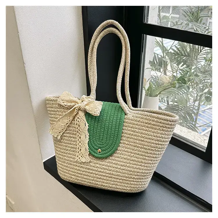 Women's woven straw tote bag with purple accent — feature 19