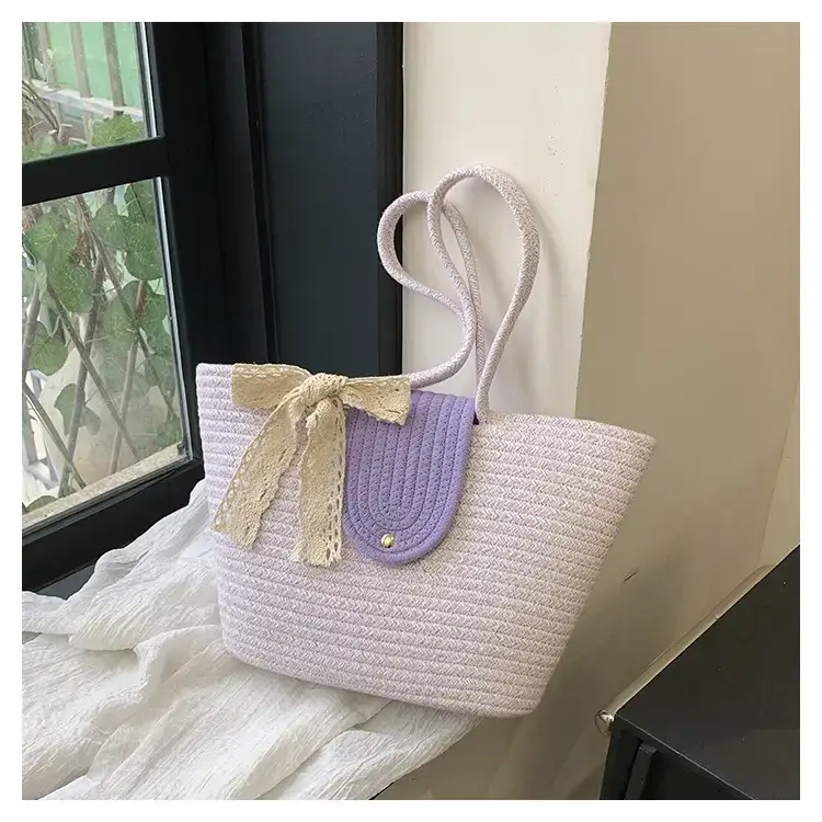 Women's woven straw tote bag with purple accent — feature 20